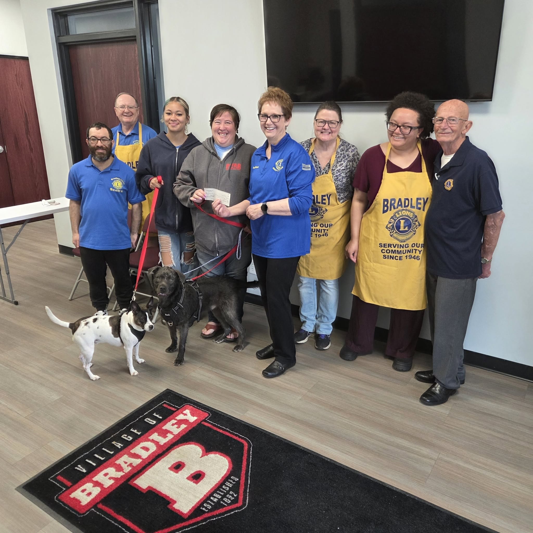 Bradley Lions members with representatives and dogs from River Valley Animal Rescue